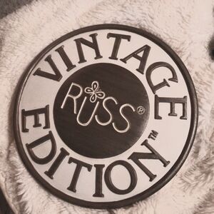 Russ Clothing Vintage Edition Table Advertisement - Clothing Brand Emblem